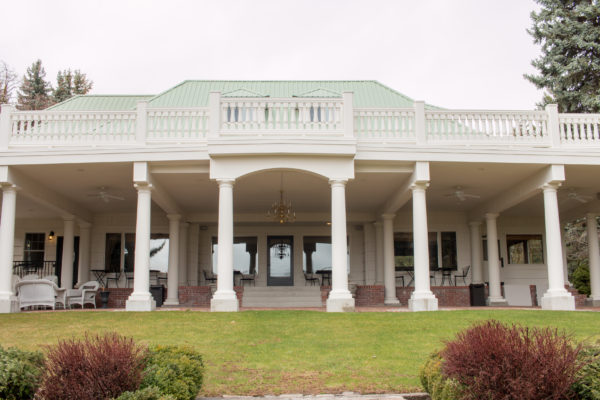 Beecher Hill House, Peshastin, Washington. Large white manor on hill, wedding planning podcast